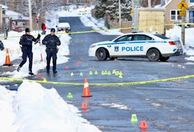 Halifax Regional Police process the scene of a shooting at the intersection of Lahey Road and Catherine Street in Dartmouth on Feb. 19, 2024, that send a 21-year-old man to hospital. Trequawn Alvontra Smith, 23, of North Preston was arrested nearby and faces 17 charges, including attempted murder.