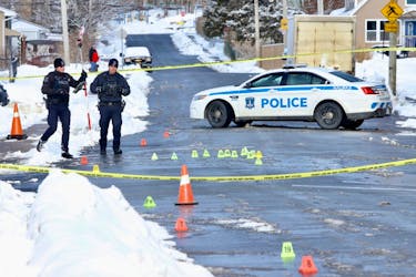Halifax Regional Police process the scene of a shooting at the intersection of Lahey Road and Catherine Street in Dartmouth on Feb. 19, 2024, that send a 21-year-old man to hospital. Trequawn Alvontra Smith, 23, of North Preston was arrested nearby and faces 17 charges, including attempted murder.