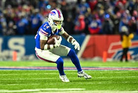 Jan 15, 2024; Orchard Park, New York, USA; Buffalo Bills wide receiver Stefon Diggs (14) runs the ball in the second half against the Pittsburgh Steelers in a 2024 AFC wild card game at Highmark Stadium. Mandatory Credit: Mark Konezny-USA TODAY Sports/File Photo