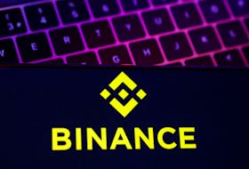 Smartphone with displayed Binance logo is placed on keyboard in this illustration taken, November 8, 2022.