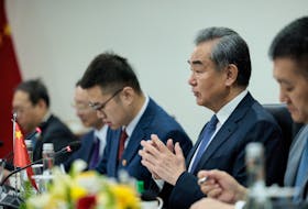 Chinese Foreign Minister Wang Yi gestures during a bilateral meeting with Indonesian Foreign Minister Retno Marsudi in Jakarta, Indonesia, April 18, 2024. Yasuyoshi Chiba/Pool via REUTERS