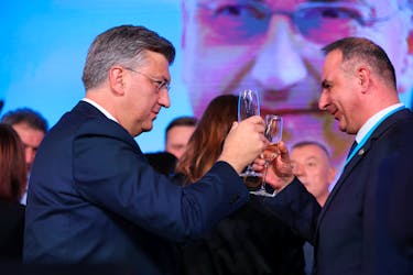 Andrej Plenkovic,  Prime Minister of Croatia, drinks champagne following the preliminary results of the country's parliamentary election, in Zagreb, Croatia, April 17, 2024. 