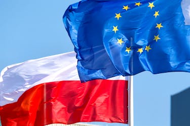 European Union and Poland's flags flutter at the Orlen refinery in Mazeikiai, Lithuania April 5, 2019.