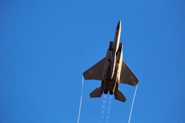 An Israeli air force F-15 fighter jet flies during an exhibition as part of a pilot graduation ceremony at the Hatzerim air base in southern Israel June 26, 2014.