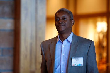 Raphael Bostic, President of the Federal Reserve Bank of Atlanta walks into the three-day "Challenges for Monetary Policy" conference in Jackson Hole, Wyoming, U.S., August 23, 2019. 