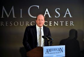 Colorado Governor Jared Polis speaks about the American Rescue Plan Act on the one year anniversary of the law during his visit to Mi Casa Resource Center in Denver, Colorado, U.S., March 11, 2022. Jason Connolly/Pool via