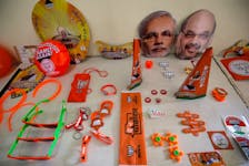 Wristbands, key chains and badges featuring India's ruling Bharatiya Janata Party (BJP) and masks of the party president Amit Shah and Prime Minister Narendra Modi are on display inside a BJP office ahead of general election in Gandhinagar, Gujarat, India, April 3, 2019.