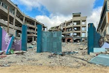 An UNRWA run-school destroyed during Israel's military offensive lies in ruins, amid the ongoing conflict between Israel and the Palestinian Islamist group Hamas, in Khan Younis in the southern Gaza Strip, April 14, 2024.