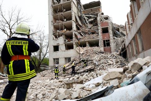 Rescuers work at the site of a destroyed building during a Russian missile strike, amid Russia's attacks on Ukraine, in Chernihiv, Ukraine April 17, 2024.