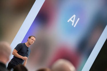 Meta CEO Mark Zuckerberg delivers a speech, as the letters AI for artificial intelligence appear on screen, at the Meta Connect event at the company's headquarters in Menlo Park, California, U.S., September 27, 2023.