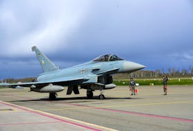German Air Force Luftwaffe servicemen direct Eurofighter Typhoon fighter after Baltic air policing mission in Lielvarde military air base, Latvia April 17, 2024.