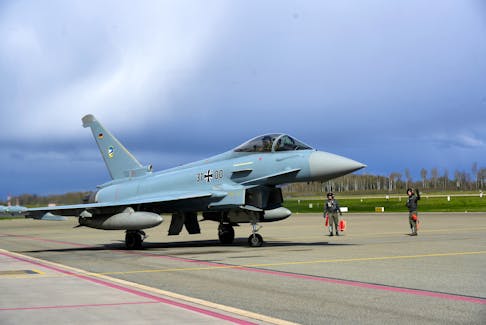 German Air Force Luftwaffe servicemen direct Eurofighter Typhoon fighter after Baltic air policing mission in Lielvarde military air base, Latvia April 17, 2024.
