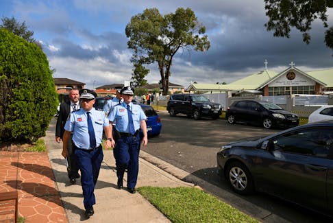 Police depart the Assyrian Christ The Good Shepherd Church after a knife attack took place during a service on Monday night, in Wakeley, Sydney, Australia, April 17, 2024.
