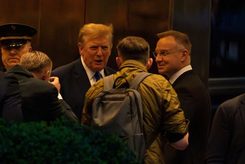 Republican presidential candidate and former U.S. President Donald Trump greets Polish President Andrzej Duda at Trump Tower in New York, U.S., April 17, 2024.