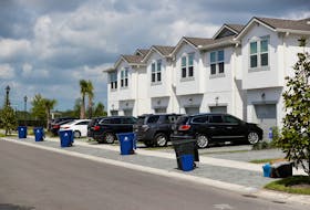 New townhomes are seen in a subdivision while building material supplies are in high demand in Tampa, Florida, U.S., May 5, 2021. 