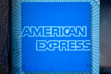 The logo of Dow Jones Industrial Average stock market index listed company American Express (AXP) is seen in Los Angeles, California, United States, April 25, 2016.