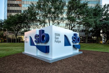 The entrance to oilfield service provider SLB's office in Houston, Texas, showing the former Schlumberger's new name and logo, is seen in this handout image taken June 2023. Courtesy of SLB/Handout via
