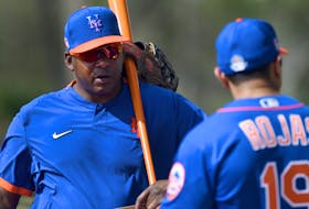 Feb 12, 2020; Port St. Lucie, Florida, USA; New York Mets bench coach Hensley Meulens (left) talks with manager Luis Rojas during the morning spring training workout. Mandatory Credit: Jim Rassol-USA TODAY Sports/File Photo