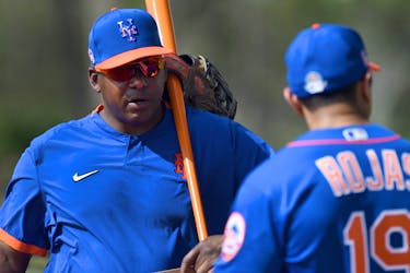 Feb 12, 2020; Port St. Lucie, Florida, USA; New York Mets bench coach Hensley Meulens (left) talks with manager Luis Rojas during the morning spring training workout. Mandatory Credit: Jim Rassol-USA TODAY Sports/File Photo