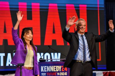 Independent presidential candidate Robert F. Kennedy, Jr. and Nicole Shanahan greet people as she becomes the vice presidential candidate of Kennedy, in Oakland, California., U.S., March 26, 2024.
