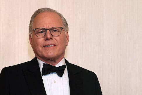 Warner Bros. Discovery chief executive David Zaslav poses on the red carpet during the Oscars arrivals at the 96th Academy Awards in Hollywood, Los Angeles, California, U.S., March 10, 2024.