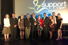 Sport Nova Scotia presented the Burgess family with the Chairman’s Award in May 2018. From left, Mel Leclerc, Peter Burgess, Lindsey Burgess, Todd Burgess, Jim Burgess, Judy Burgess, Craig Burgess, Allyson Burgess, Andrew Burgess, and Karlee Burgess. CONTRIBUTED