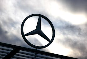 A logo of the Mercedes-Benz is seen outside a Mercedes-Benz car dealer in Brussels, Belgium March 13, 2023.