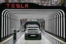 Model Y cars are pictured during the opening ceremony of the new Tesla Gigafactory for electric cars in Gruenheide, Germany, March 22, 2022. Patrick Pleul/Pool via