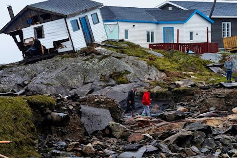 Persons head to their homes in the aftermath of Hurricane Fiona in Burnt Islands, Newfoundland, Canada September 27, 2022.