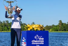 Apr 21, 2024; The Woodlands, Texas, USA; Nelly Korda (USA) celebrates winning The Chevron Championship golf tournament. Mandatory Credit: Thomas Shea-USA TODAY Sports