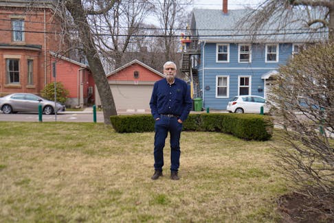 John Moses, minister at Trinity United Church, stands in the green space area of the church, which will be turned into a community garden for people to grow their food. He said people can grow any food they want except for potatoes. Vivian Ulinwa/SaltWire