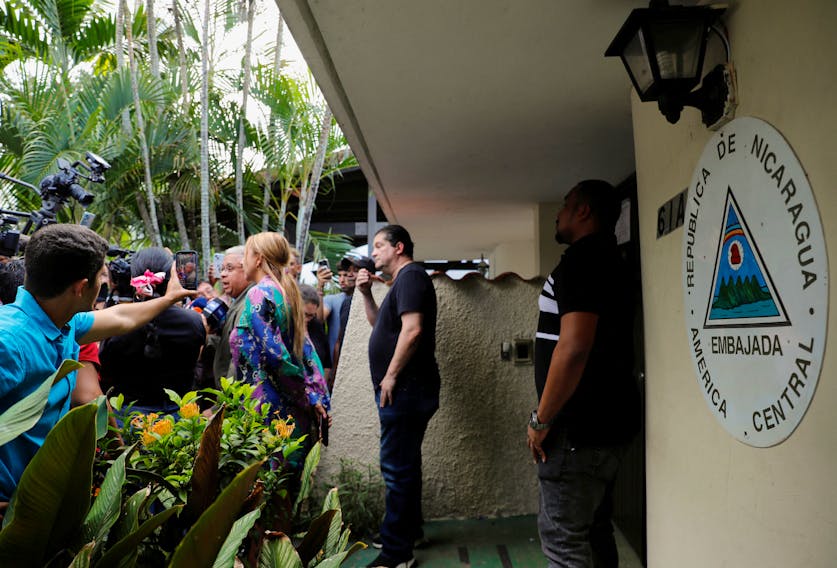 Panama's former President Ricardo Martinelli's lawyer Roniel Ortiz, speaks with members of the media outside of the Nicaraguan embassy in Panama City, after Martinelli requested asylum at the Nicaraguan embassy, in Panama City, Panama, February 7, 2024.