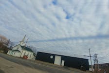 This dark line across the clouds in Falmouth, N.S., appears to be a contrail shadow. -Contributed/Joan Alyward Mansfield