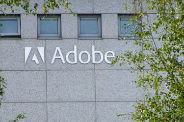 A logo of Adobe Inc. is pictured at the company's office in Citywest Business Campus, Saggart, Ireland October 19, 2021.