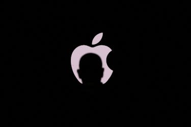 A journalist attends the presentation of the new iPhone 14 at an Apple event, at their headquarters in Cupertino, California, U.S. September 7, 2022.