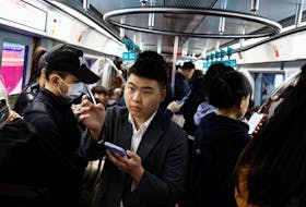 People ride a subway train during morning rush hour in Beijing, China April 11, 2024.