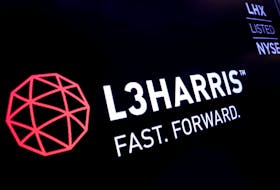 The logo and ticker for L3Harris are displayed on a screen on the floor of the New York Stock Exchange (NYSE) in New York, U.S., July 1, 2019.