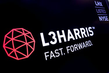 The logo and ticker for L3Harris are displayed on a screen on the floor of the New York Stock Exchange (NYSE) in New York, U.S., July 1, 2019.
