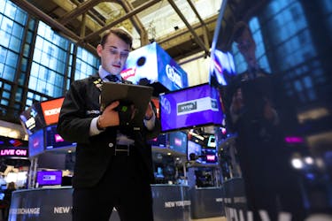 A trader works on the trading floor at the New York Stock Exchange (NYSE) in New York City, U.S., April 5, 2024.