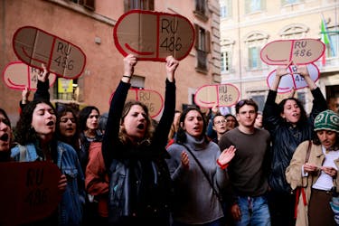 Women hold cardboard cutouts of RU-486 (abortion pill mifepristone) as they demonstrate outside Madama Palace (Senate) against a parliamentary amendment that could make it easier for anti-abortion groups to operate in publicly-run family clinics, in Rome, Italy, April 22, 2024.