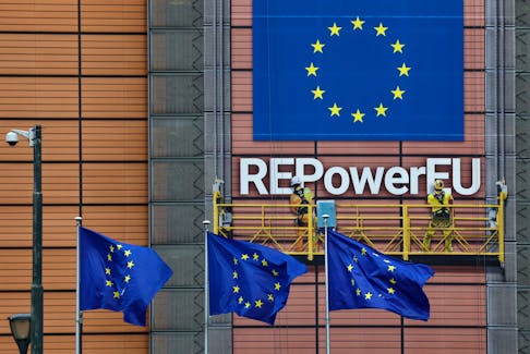 European Union flags flutter outside the EU Commission headquarters in Brussels, Belgium, April 12, 2022.