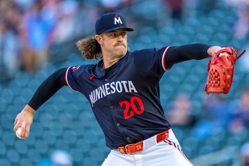 Apr 22, 2024; Minneapolis, Minnesota, USA; Minnesota Twins starting pitcher Chris Paddack (20) delivers a pitch against the Chicago White Sox in the first inning at Target Field. Mandatory Credit: Jesse Johnson-USA TODAY Sports
