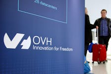 Visitors stand at the French web-hosting and server provider OVH Group new headquarters in Paris, France, October 17, 2018.
