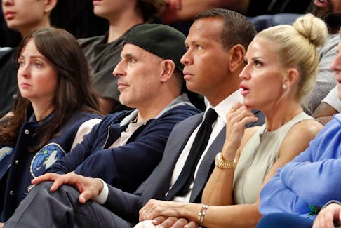 Apr 14, 2024; Minneapolis, Minnesota, USA; Minnesota Timberwolves and Lynx minority owners Marc Lore and Alex Rodriguez watch in the fourth quarter of the game against the Phoenix Suns at Target Center. Mandatory Credit: Bruce Kluckhohn-USA TODAY Sports/File Photo