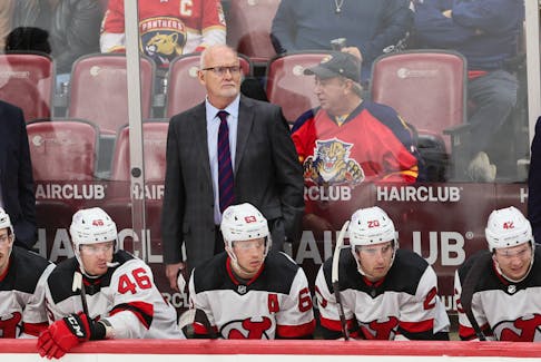 Jan 13, 2024; Sunrise, Florida, USA; New Jersey Devils head coach Lindy Ruff looks on from the bench against the Florida Panthers during the third period at Amerant Bank Arena. Mandatory Credit: Sam Navarro-USA TODAY Sports/File Photo