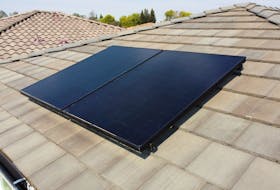 Solar panels from SunPower are installed on residential buildings at a model home display in the Eureka Grove neighborhood of Granite Bay, California, U.S., October 5, 2021.