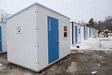 Pallet shelters are being set up outside Beacon House in Lower Sackville on Tuesday, February 6, 2024.