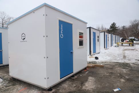 Pallet shelters are being set up outside Beacon House in Lower Sackville on Tuesday, February 6, 2024.