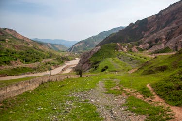 A view shows a river in a mountainous area near the town of Mailuu-Suu in the Jalal-Abad region, Kyrgyzstan, April 20, 2024. Dams holding vast amounts of uranium mine tailings above the fertile Fergana valley in Central Asia are unstable, threatening a possible Chernobyl-scale nuclear disaster if they collapse that would make the region uninhabitable, studies have revealed.