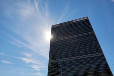 The sun shines behind the United Nations Secretariat Building at the United Nations Headquarters, in New York City, New York, U.S., June 18, 2021.